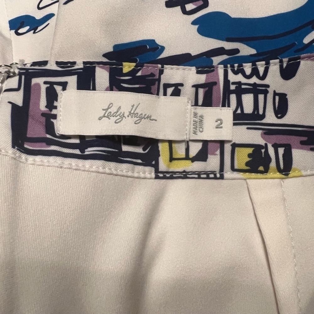 LADY HAGEN Golf / Tennis Skorts in City/Village Art Print Size 2 - Picture 4 of 6